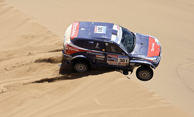 Illustration for article titled Dakar Rally: A Racing Photographer's Wet Dream